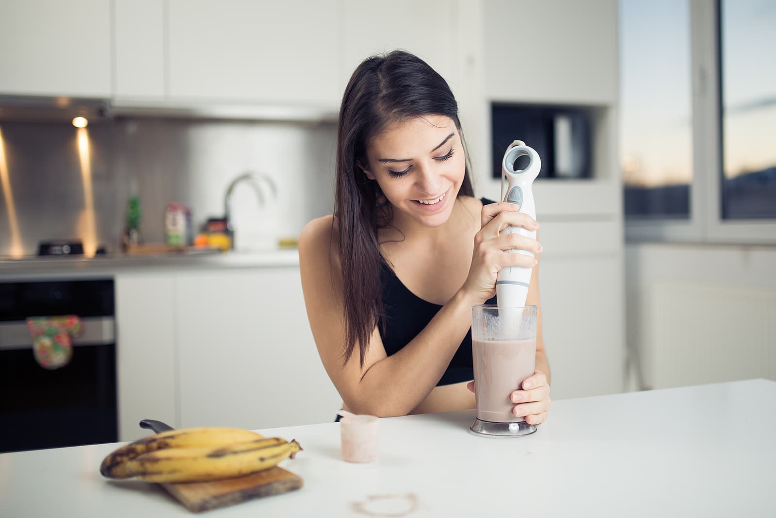 meal replacement shakes - Woman with hand blender